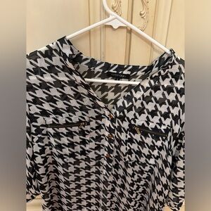 Black and white semi see through t shirt with front pockets